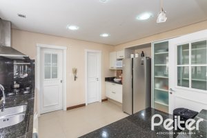 Casa em Condomínio à venda com 386m², 4 dormitórios, 4 suítes, 4 vagas, no bairro Terra Ville em PORTO ALEGRE