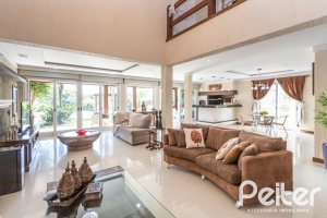 Casa em Condomínio à venda com 386m², 4 dormitórios, 4 suítes, 4 vagas, no bairro Terra Ville em PORTO ALEGRE