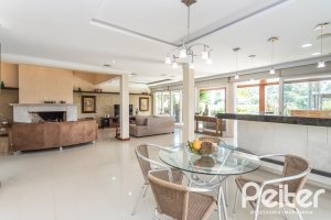 Casa em Condomínio à venda com 386m², 4 dormitórios, 4 suítes, 4 vagas, no bairro Terra Ville em PORTO ALEGRE