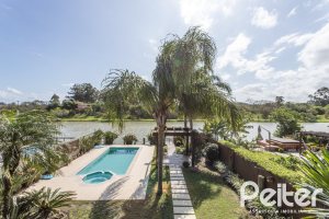 Casa em Condomínio à venda com 386m², 4 dormitórios, 4 suítes, 4 vagas, no bairro Terra Ville em PORTO ALEGRE