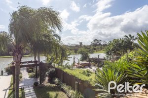 Casa em Condomínio à venda com 386m², 4 dormitórios, 4 suítes, 4 vagas, no bairro Terra Ville em PORTO ALEGRE