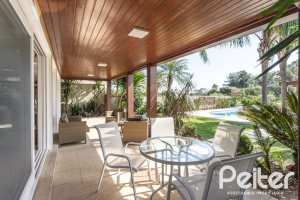 Casa em Condomínio à venda com 386m², 4 dormitórios, 4 suítes, 4 vagas, no bairro Terra Ville em PORTO ALEGRE