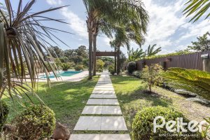 Casa em Condomínio à venda com 386m², 4 dormitórios, 4 suítes, 4 vagas, no bairro Terra Ville em PORTO ALEGRE