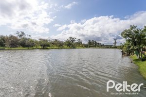 Casa em Condomínio à venda com 386m², 4 dormitórios, 4 suítes, 4 vagas, no bairro Terra Ville em PORTO ALEGRE