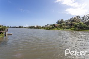 Casa em Condomínio à venda com 386m², 4 dormitórios, 4 suítes, 4 vagas, no bairro Terra Ville em PORTO ALEGRE