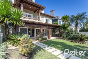 Casa em Condomínio à venda com 386m², 4 dormitórios, 4 suítes, 4 vagas, no bairro Terra Ville em PORTO ALEGRE