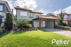 Casa em Condomínio à venda com 386m², 4 dormitórios, 4 suítes, 4 vagas, no bairro Terra Ville em PORTO ALEGRE