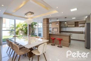 Casa em Condomínio à venda com 312m², 4 dormitórios, 4 suítes, 4 vagas, no bairro Hipica em PORTO ALEGRE