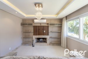 Casa em Condomínio à venda com 312m², 4 dormitórios, 4 suítes, 4 vagas, no bairro Hipica em PORTO ALEGRE