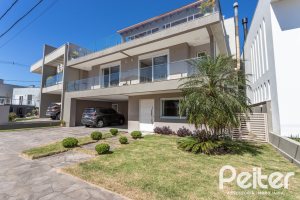 Casa em Condomínio à venda com 312m², 4 dormitórios, 4 suítes, 4 vagas, no bairro Hipica em PORTO ALEGRE