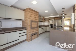 Casa em Condomínio à venda com 312m², 4 dormitórios, 4 suítes, 4 vagas, no bairro Hipica em PORTO ALEGRE