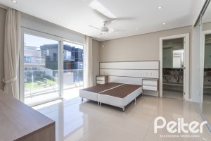 Casa em Condomínio à venda com 312m², 4 dormitórios, 4 suítes, 4 vagas, no bairro Hipica em PORTO ALEGRE