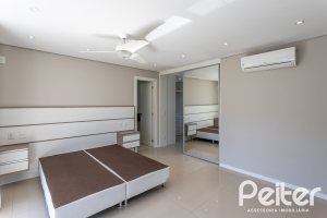 Casa em Condomínio à venda com 312m², 4 dormitórios, 4 suítes, 4 vagas, no bairro Hipica em PORTO ALEGRE