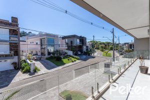 Casa em Condomínio à venda com 312m², 4 dormitórios, 4 suítes, 4 vagas, no bairro Hipica em PORTO ALEGRE