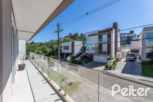 Casa em Condomínio à venda com 312m², 4 dormitórios, 4 suítes, 4 vagas, no bairro Hipica em PORTO ALEGRE