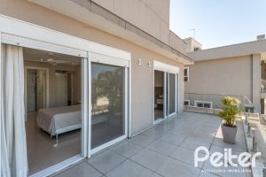 Casa em Condomínio à venda com 312m², 4 dormitórios, 4 suítes, 4 vagas, no bairro Hipica em PORTO ALEGRE