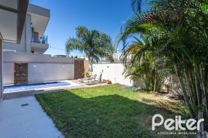 Casa em Condomínio à venda com 312m², 4 dormitórios, 4 suítes, 4 vagas, no bairro Hipica em PORTO ALEGRE