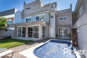 Casa em Condomínio à venda com 312m², 4 dormitórios, 4 suítes, 4 vagas, no bairro Hipica em PORTO ALEGRE
