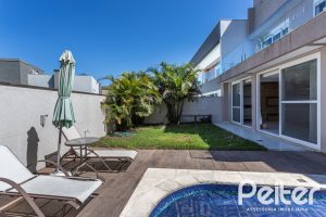 Casa em Condomínio à venda com 312m², 4 dormitórios, 4 suítes, 4 vagas, no bairro Hipica em PORTO ALEGRE