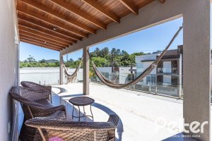 Casa em Condomínio à venda com 312m², 4 dormitórios, 4 suítes, 4 vagas, no bairro Hipica em PORTO ALEGRE