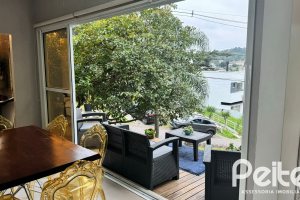 Casa em Condomínio à venda com 150m², 4 dormitórios, 1 suíte, 2 vagas, no bairro Ipanema em PORTO ALEGRE