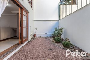 Casa em Condomínio à venda com 225m², 3 dormitórios, 1 suíte, 2 vagas, no bairro Jardim Isabel em Porto Alegre