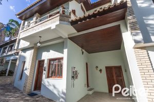 Casa em Condomínio à venda com 225m², 3 dormitórios, 1 suíte, 2 vagas, no bairro Jardim Isabel em Porto Alegre