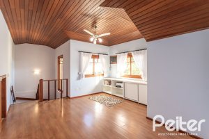 Casa em Condomínio à venda com 225m², 3 dormitórios, 1 suíte, 2 vagas, no bairro Jardim Isabel em Porto Alegre