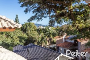 Casa em Condomínio à venda com 225m², 3 dormitórios, 1 suíte, 2 vagas, no bairro Jardim Isabel em Porto Alegre