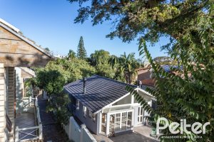 Casa em Condomínio à venda com 225m², 3 dormitórios, 1 suíte, 2 vagas, no bairro Jardim Isabel em Porto Alegre