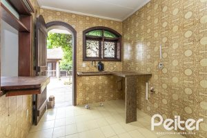 Casa à venda com 265m², 5 dormitórios, 1 suíte, 3 vagas, no bairro Tristeza em Porto Alegre