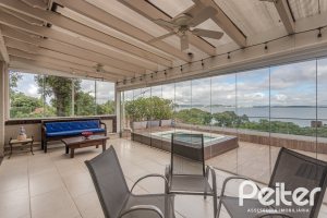 Casa à venda com 330m², 4 dormitórios, 2 suítes, 4 vagas, no bairro Vila Assunção em Porto Alegre