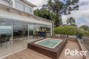 Casa à venda com 330m², 4 dormitórios, 2 suítes, 4 vagas, no bairro Vila Assunção em Porto Alegre