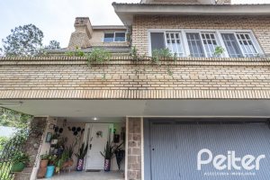 Casa em Condomínio à venda com 330m², 3 dormitórios, 1 suíte, 4 vagas, no bairro Jardim Isabel em Porto Alegre