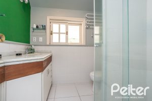 Casa em Condomínio à venda com 330m², 3 dormitórios, 1 suíte, 4 vagas, no bairro Jardim Isabel em Porto Alegre