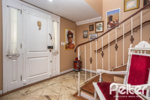 Casa em Condomínio à venda com 330m², 3 dormitórios, 1 suíte, 4 vagas, no bairro Jardim Isabel em Porto Alegre