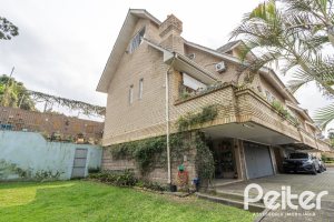 Casa em Condomínio à venda com 330m², 3 dormitórios, 1 suíte, 4 vagas, no bairro Jardim Isabel em Porto Alegre