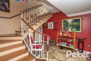 Casa em Condomínio à venda com 330m², 3 dormitórios, 1 suíte, 4 vagas, no bairro Jardim Isabel em Porto Alegre