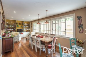 Casa em Condomínio à venda com 330m², 3 dormitórios, 1 suíte, 4 vagas, no bairro Jardim Isabel em Porto Alegre