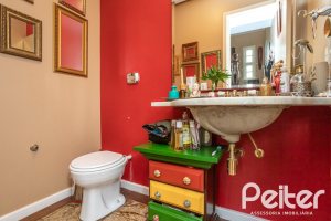 Casa em Condomínio à venda com 330m², 3 dormitórios, 1 suíte, 4 vagas, no bairro Jardim Isabel em Porto Alegre