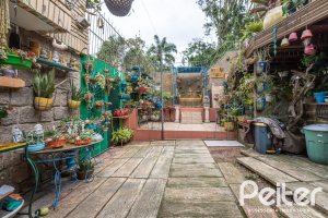 Casa em Condomínio à venda com 330m², 3 dormitórios, 1 suíte, 4 vagas, no bairro Jardim Isabel em Porto Alegre