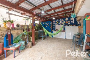 Casa em Condomínio à venda com 330m², 3 dormitórios, 1 suíte, 4 vagas, no bairro Jardim Isabel em Porto Alegre