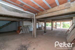 Casa à venda com 450m², 3 dormitórios, 3 suítes, 6 vagas, no bairro Vila Assunção em Porto Alegre