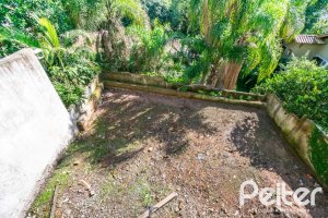 Casa à venda com 450m², 3 dormitórios, 3 suítes, 6 vagas, no bairro Vila Assunção em Porto Alegre