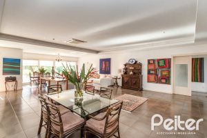 Casa em Condomínio à venda com 276m², 2 dormitórios, 2 suítes, 2 vagas, no bairro Terra Ville em PORTO ALEGRE