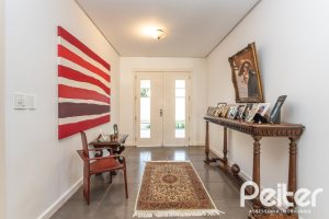 Casa em Condomínio à venda com 276m², 2 dormitórios, 2 suítes, 2 vagas, no bairro Terra Ville em PORTO ALEGRE