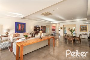 Casa em Condomínio à venda com 276m², 2 dormitórios, 2 suítes, 2 vagas, no bairro Terra Ville em PORTO ALEGRE