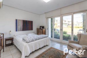 Casa em Condomínio à venda com 276m², 2 dormitórios, 2 suítes, 2 vagas, no bairro Terra Ville em PORTO ALEGRE