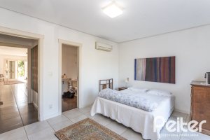 Casa em Condomínio à venda com 276m², 2 dormitórios, 2 suítes, 2 vagas, no bairro Terra Ville em PORTO ALEGRE