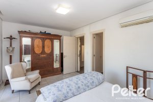 Casa em Condomínio à venda com 276m², 2 dormitórios, 2 suítes, 2 vagas, no bairro Terra Ville em PORTO ALEGRE